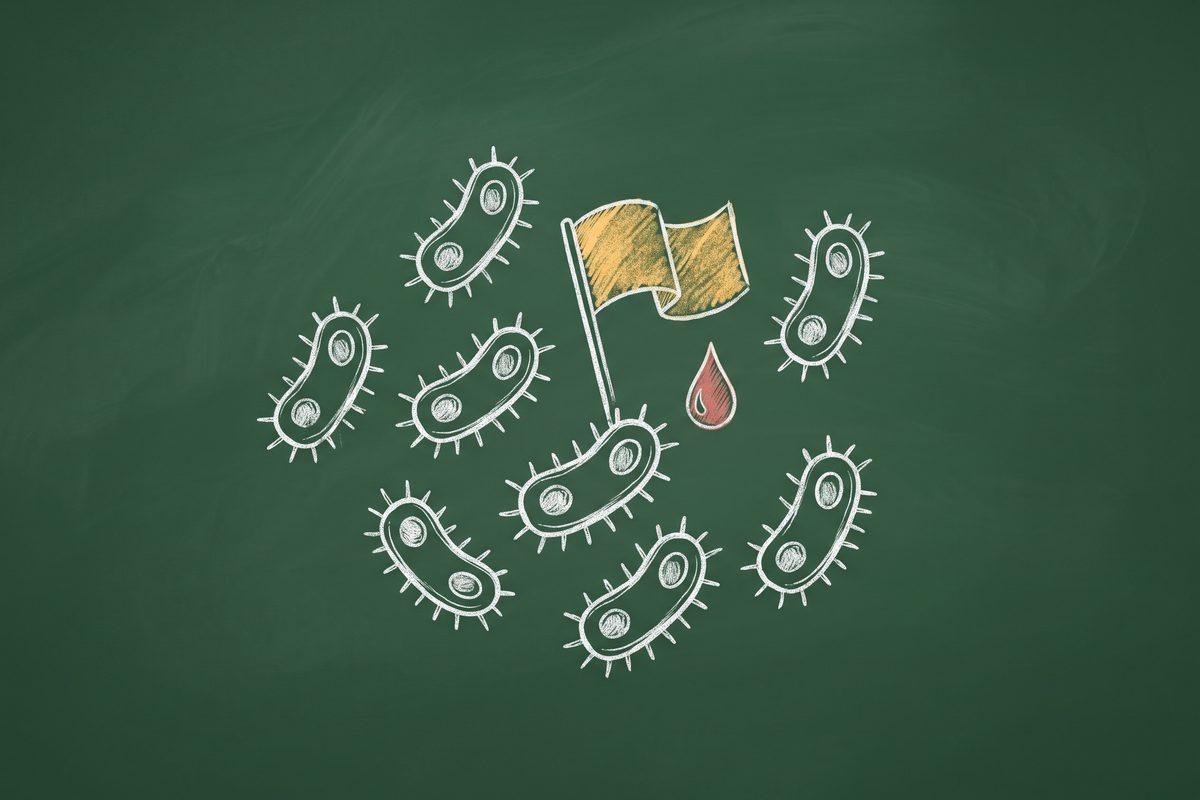 Nine small bacterium icons in a loose cluster with a warm yellow flag icon rising from the middle, and a blood droplet icon beside it.