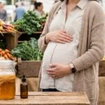 A Mother's Weight Changes the Microbial Signals Reaching Her Unborn Child